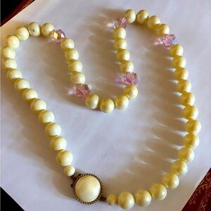 Cream and pink vintage pearl necklace
26”lenght